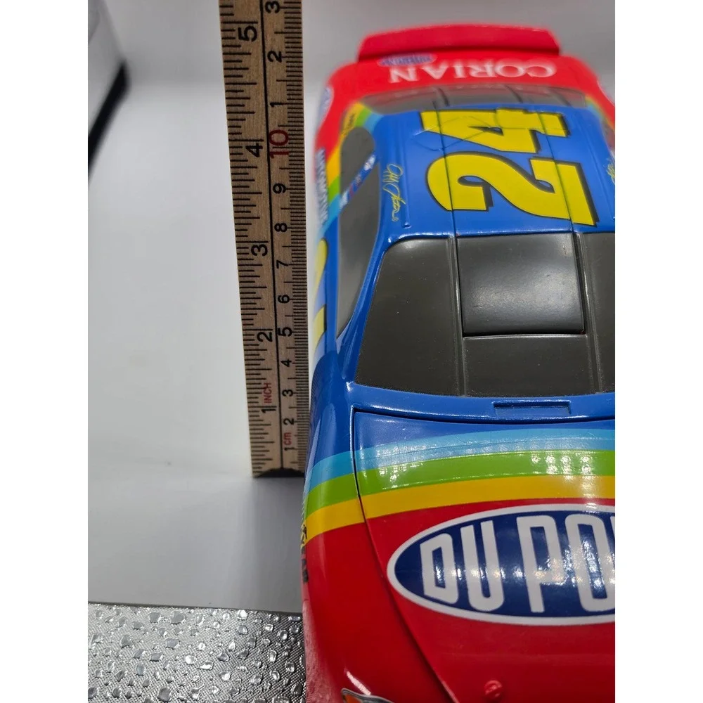 Jeff Gordon 24 DuPont Rainbow Warrior NASCAR Stock Car Toy Stamper Spare Tire